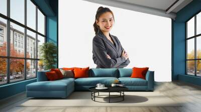 Portrait of businesswoman smiling and posing with arms crossed, isolated on a white background. Wall mural