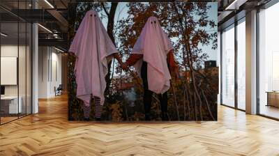 Friends Dressed in Homemade Sheet Ghost Costumes for Halloween Wall mural