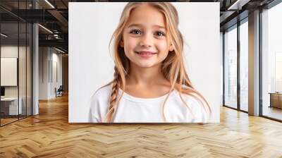  girl with long hair and braids smiling at the camera. Wall mural