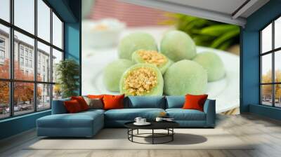 Chinese dessert or sweet mochi with ground peanut and sugar filling Wall mural