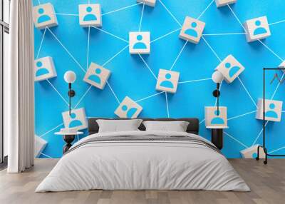 Seamless social network or connecting people concept using wood square block on blue background Wall mural