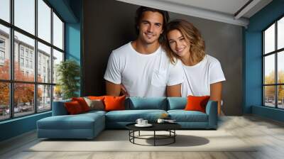 Two hipster models man and woman wearing blank t-shirt, posing against white wall, front tshirt mockup for couple Wall mural