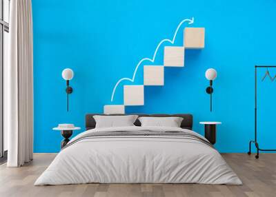 Wood block stacking as step stair up, ladder career path concept for business growth success process Wall mural