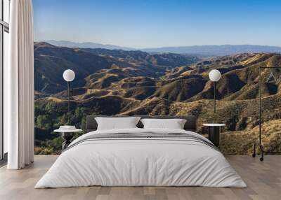 Long dry hills sweep down to a southern Californian canyon. Wall mural