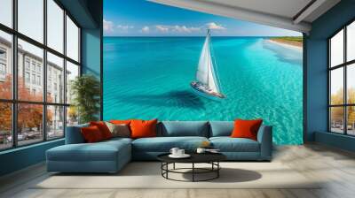 A sailboat in the middle of a beautiful wide sea, from air view Wall mural