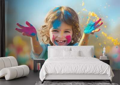 Celebration day colorful of child covered in paint on blur background Wall mural