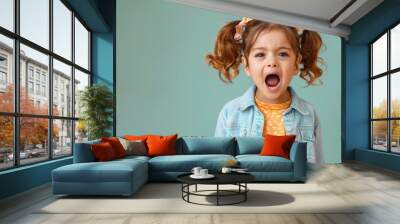 screaming emotional little girl child standing isolated Wall mural