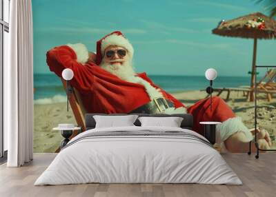 Santa Relaxing on a Tropical Beach in Summer with Sunglasses and Santa Suit Wall mural