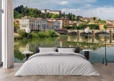 Panoramic summer view of Ponte alle Grazie with river Arno in Florence, Italy Wall mural