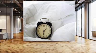 alarm clock on table in the bed room on morning Wall mural