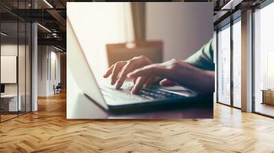 Close up of people typing on keyboard notebook on the table. Wall mural