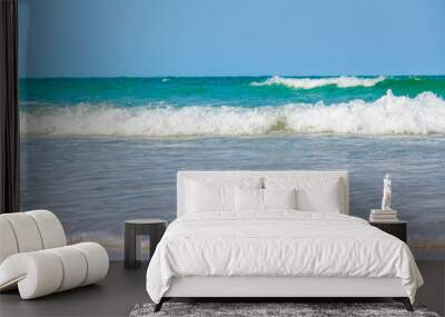 Ocean waves on the sandy beach for background, concept of the beach in the summer Wall mural