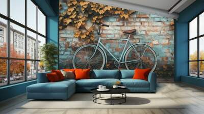 A classic bicycle leaning against a weathered brick wall covered in ivy. Wall mural