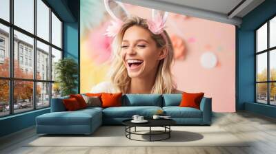 Image of young woman wearing an Easter rabbit headband with ears. Wall mural