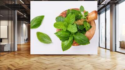 Alternative medicine fresh herbs in the wooden mortar . Food ing Wall mural