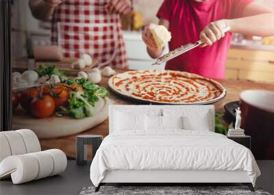 mother and daughter preparing pizza Wall mural