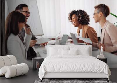 Multi ethnic group of business people having small talk and laughing Wall mural