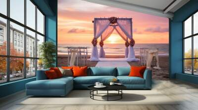 A beachside wedding ceremony at sunrise Wall mural