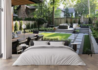 A renovated backyard with a new patio, landscaping, and outdoor furniture Wall mural