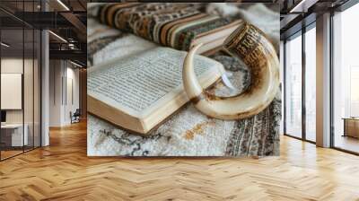 Symbols of the Yom Kippur holiday. Shofar and prayer book on a towel. Wall mural