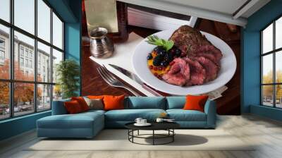 meat with berries Wall mural