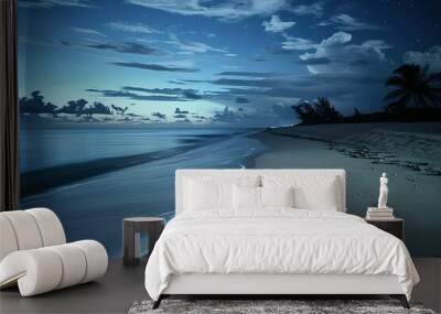 a beach at night with footprints in the sand Wall mural