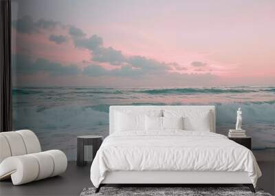 a beach with waves coming in to shore Wall mural