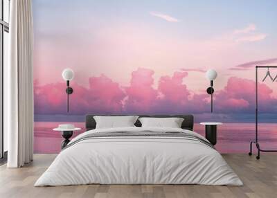 a large body of water under a cloudy sky Wall mural