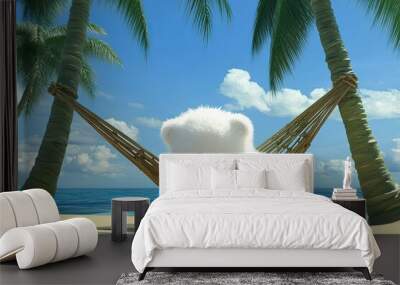 a white teddy bear laying in a hammock between two palm trees Wall mural