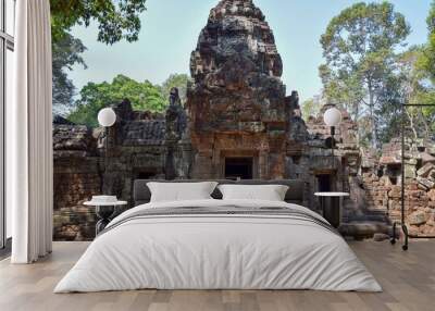 angkor wat ancient temple ruins with tower in front of jungle, cambodia, southeasi asia Wall mural