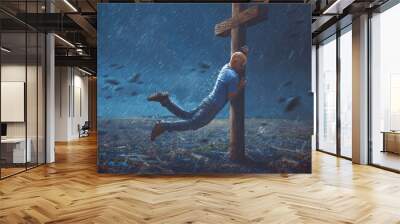 Man clinging to cross Wall mural