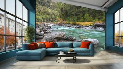 The Matukituki River is colored a deep green color from the rock flour generated by glaciers that feed it. South island, New Zealand. Wall mural