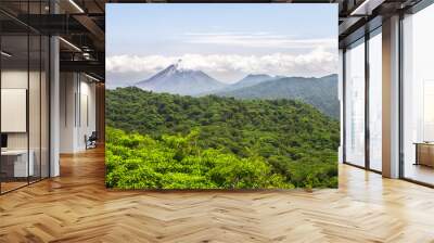 Volcan Arenal dominates the horizon above the dense jungle in central Costa Rica. Wall mural