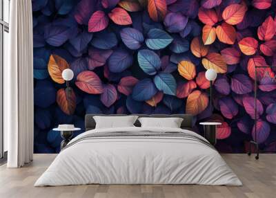 A rich tapestry of leaves in various hues of purple, orange, and blue fills the frame, showcasing the beauty of nature's color palette during autumn, background Wall mural