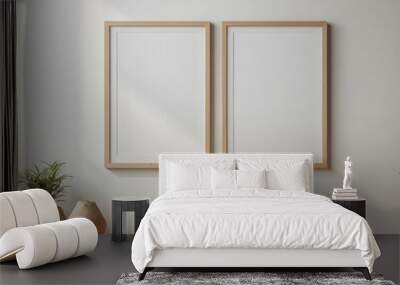 Mockup of two poster, photo frame on wooden table with white wall background Wall mural