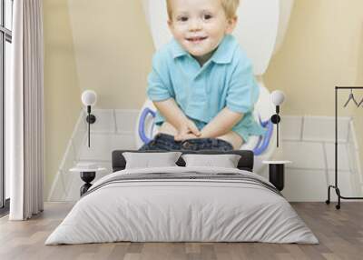 little boy sitting on toilet Wall mural