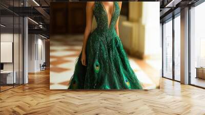 A beautiful supermodel with a green sequined dress decorated with peacock feathers Wall mural