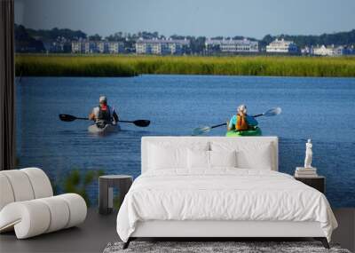 A couple on a kayak by the bay near Bethany Beach, Delaware, U.S Wall mural