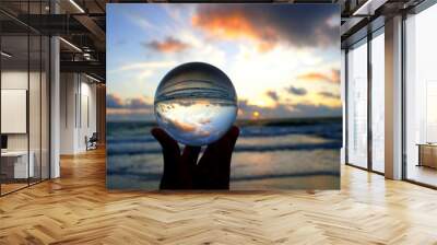 Beautiful clouds during sunrise captured through a lens ball at Fort Lauderdale Beach, Florida, U.S.A Wall mural