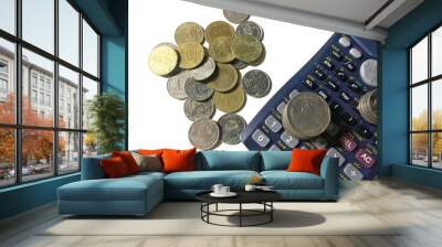 Piles of coins and stacking coins on calculator with white background. Business, savings money, finance, and counting budget concept. Wall mural