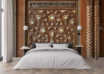 Single arabesque sash of an old mamluk era cupboard with geometrical decorations, Zeinab Khatoon historic house, Cairo, Egypt Wall mural