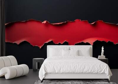 Red ripped paper strips with torn edges isolated on a black background Wall mural