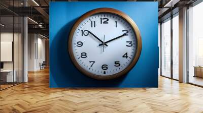 clock on blue background Wall mural