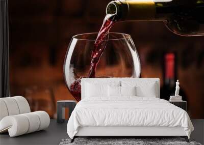 red wine pouring into glass Wall mural