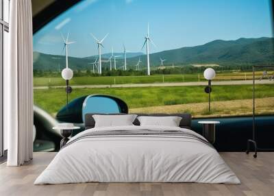 Wind Turbines Seen From a Car Window Wall mural