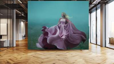  Fantasy woman blonde hair queen runs in fog summer green forest. Pink royal silk satin dress fluttering fly waving in wind motion Art photo. Scared Girl fairy tale beauty princess escape from reality Wall mural