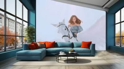 bright sky and sunlight, majestic girl with dark flying hair riding horse, an angel in gray vintage dress with open bare shoulders on back of gorgeous white pegasus with light elegant wings Wall mural