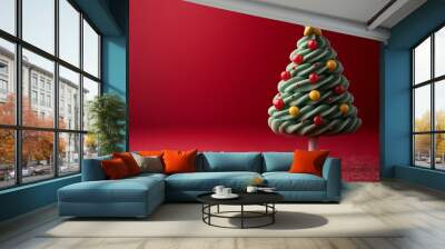 Christmas tree lollipop on a red background, Christmas tree shaped popsicle. Christmas candy concept. Flat lay.  Wall mural