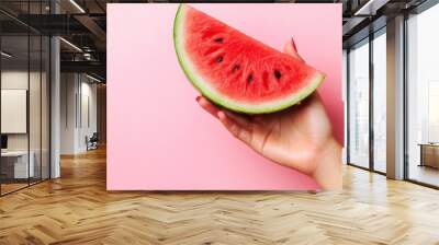 Hand Holding Fresh Watermelon Slice on Pink
 Wall mural