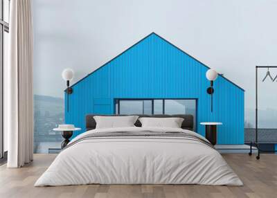 exterior of swiss designer wooden house in a minimalist style with blue color Wall mural